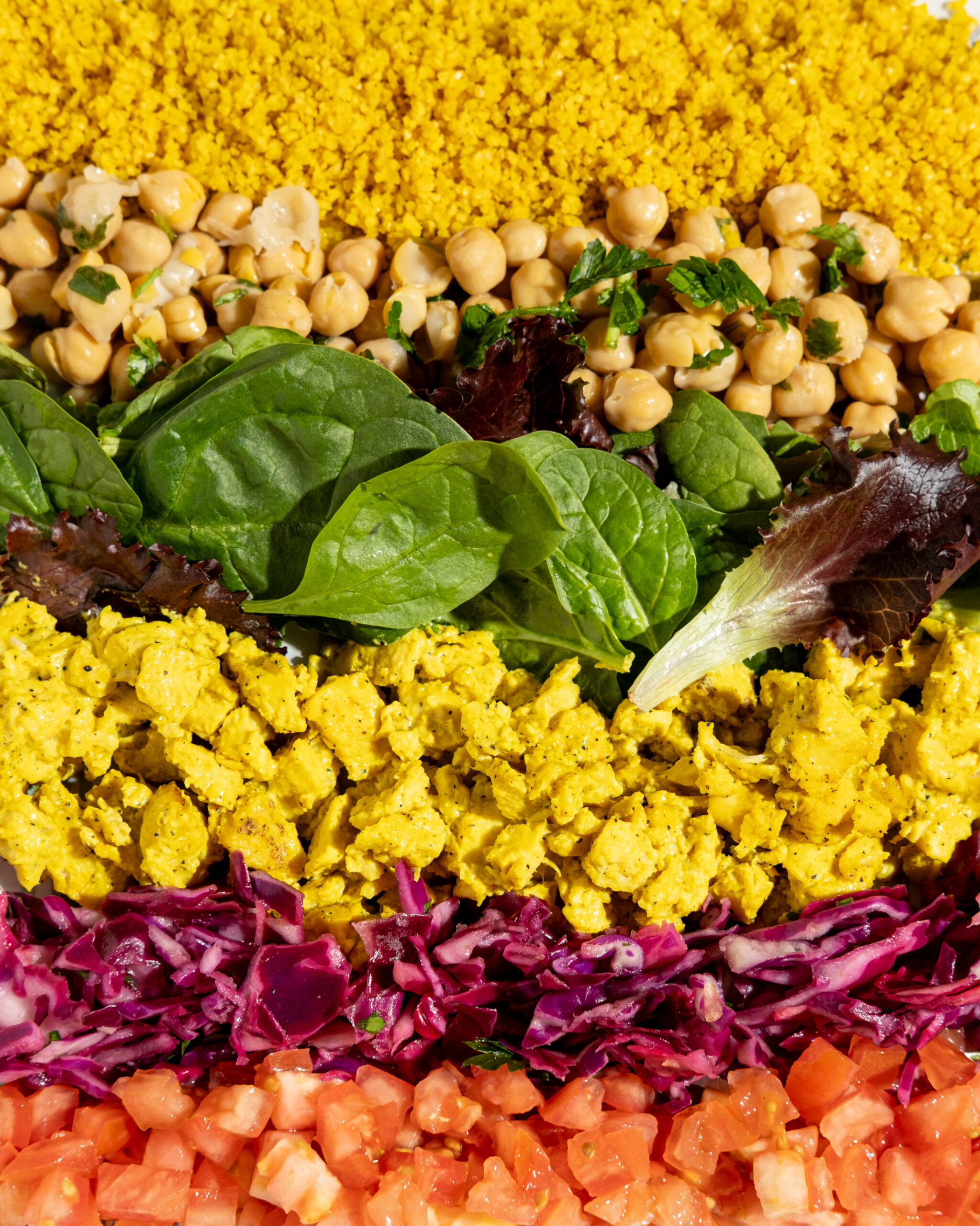 Territory Overlap, Protected Zones, and Encroachment — What Every Franchise Buyer Should Understand A bright how to negotiate a franchise territory consultation moment inside a Mediterranean fast casual restaurant, with fresh hummus and mezze displayed on a polished counter under warm afternoon light